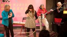 A performance by Marcy Marxer, Cathy Fink and Barbara Lamb in Chengdu, Sichuan.