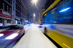 Cars driving through traffic