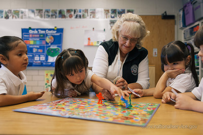 Foster Grandparent Grandma Emma works with on letter recognition with Pre-K students from Francis M.Day School in Denver, CO.