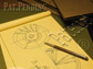 Graphic illustration showing folders,pencil and notepad with drawings and the text pat pending