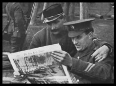 A French officer and his British ally at the front read the New York Times.