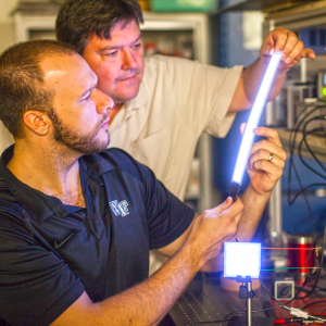 Wake Forest University engineers with the experimental light.