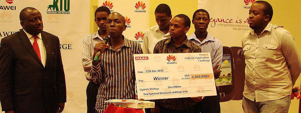 State Minister for ICT Hon. Nyombi Tembo (L) with the HUAWEI Android Applications Challenge (HAAC) 2012 Winning Team from CEDAT, Makerere University, Kampaala Uganda, 5th December 2012