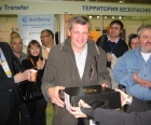 One happy broadcaster is cheered as he receives a marketing prize at Russia Internet World.