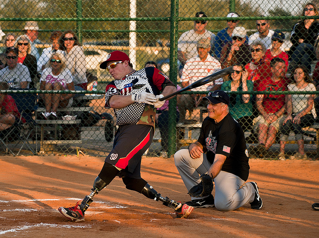 Image description: Josh Wege, a Wounded Warrior Amputee Softball Team player, hits a ball into the outfield at the Morgan Sports Center in Destin, Florida. The teams played to raise awareness of the sacrifices and resilience of military members.
Photo by Randy Gon, U.S. Air Force.