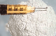syringe with powdered heroin