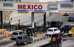Cars crossing the U.S.-Mexico border.  The U.S. and Mexico had half a billion dollars in two-way trade in goods and services in 2011, and more than 6 million jobs in the United States depend on trade with Mexico. (Photo Commerce) 