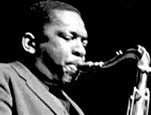 Saxophonist John Coltrane, Randalls Island, New York City, 1958. Photograph by Chuck Stewart.