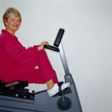 Photograph of a senior woman on an exercise bike