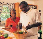 man fixing a salad