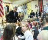 Senator Blunt visiting his granddaughter's first grade class and reading the students 