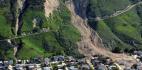 Aerial view of a land slide down a mountain with earth covering