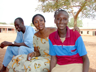 A young scholarship recipient and her mentor in Benin. Photo credit: André Roussel/USAID. 