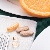 Breakfast setting with dietary supplement pills