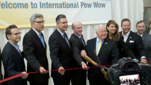 Under Secretary of Commerce for International Trade Francisco Sanchez cuts the ribbon to open Pow Wow 2012 with Travel and Tourism officials