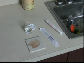 Still image linking toVideo Demonstrating Collecting a Sample from a Smear