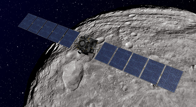 Artist's concept of the Dawn spacecraft soaring over the giant asteroid Vesta.