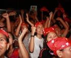 Supporters of Aung San Suu Kyi celebrate after her victory.