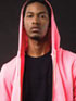 Poster of African American male in a pink hoodie facing forward