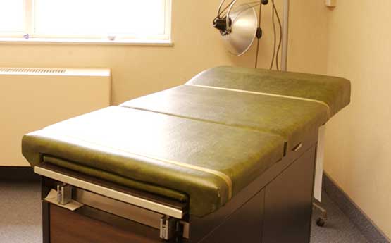 Photo of physician's examination table.