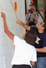 First Lady Michelle Obama Volunteers on 9/11 Day of Service and Remembrance - September 2010 : First Lady Michelle Obama joined Corporation for National and Community Service CEO Patrick Corvington and nearly two hundred veterans, active duty service members, retirees and student volunteers in serving together to renovate the Vinson Hall Retirement Community in McLean, VA.  Vinson Hall is supported by the Navy marine Coast Guard Residence Foundation and among its residents are Navy Veterans of the Battles of Pearl Harbor and Midway.   Together, they repainted the loading dock’s walls and ceiling, painted the sprinkler system, restained and repaired wood ramps, and repainted and resealed the cement floor. Other volunteers worked together on a gardening project.

The First Lady joined Americans across the country in marking the ninth anniversary of the 9/11 attacks by participating in service and remembrance activities.

Please click on a thumbnail to the left to view the larger image. Various photo sizes, as well as additional information about the image, is available by hovering your mouse over the larger image to the right.  You can also download the original image by selecting "Save Photo"