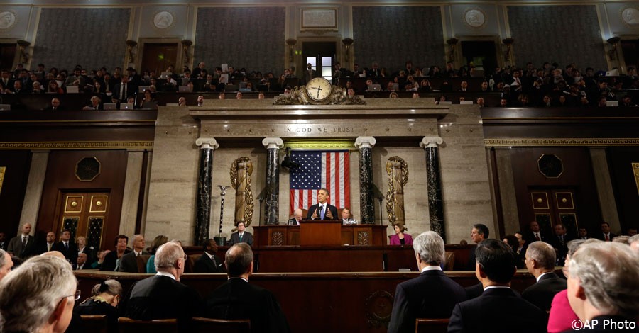 President Barack Obama, flanked by Vice President Joe Biden and House Speaker John Boehner of Ohio, gives his State of the Union address during a joint session of Congress on Capitol Hill in Washington, February 12, 2013. [AP Photo]
