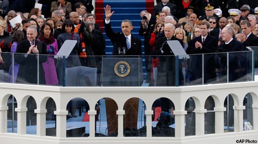 President Barack Obama waves to crowd after his Inaugural speech at the ceremonial swearing-in at the U.S. Capitol during the 57th Presidential Inauguration in Washington on January 21, 2013. [AP Photo]