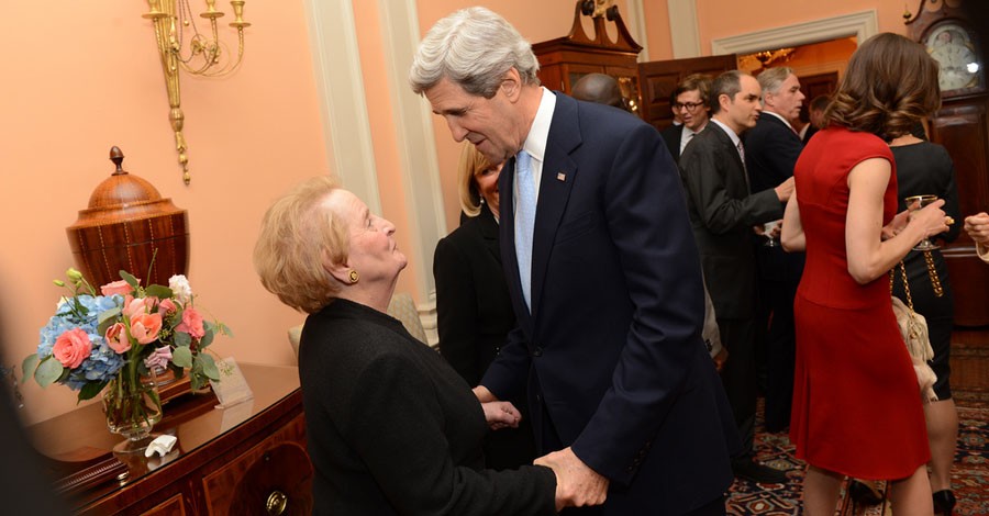 U.S. Secretary of State John Kerry greets former U.S. Secretary of State Madeleine Albright before his ceremonial swearing-in at the U.S. Department of State in Washington, D.C., February 6, 2013. [State Department photo/ Public Domain]