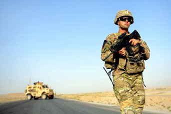 The Post-9/11 GI Bill allows Soldiers who meet the necessary criteria to transfer educational benefits to their spouse or child. Here, Sgt. Brandon Bregel prepares to clear a bridge in Zabul province, Afghanistan.