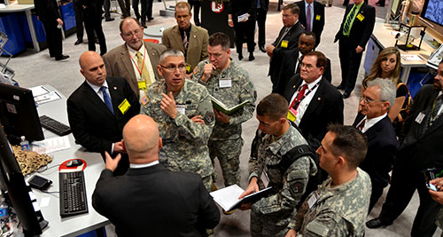 Photo of Lt. Gen. Rhett A. Hernandez, discussing the command with staff and industry representatives at the
Association of the United States Army Annual Meeting and Exposition