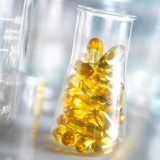 Cod liver oil capsules in a conical flask