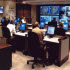 Picture of staff, monitors and computers in the HHS Secretary's Operations Center