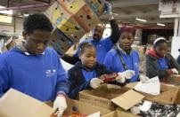 Volunteers help out at the Community Food Bank of New Jersey to support disaster survivors.