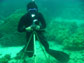 Diver under water with camera