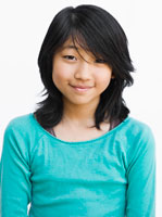 Smiling Asian teenager.