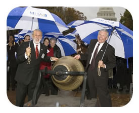 (WASHINGTON, D.C., Nov. 16, 2006)—Mental Health America Board Chair Sergio Aguilar-Gaxiola, M.D.; President and CEO David L. Shern, Ph.D.; and other health advocates join in ringing the Mental Health Bell on Capitol Hill this morning to launch a new name for the century-old National Mental Health Association. The Bell was forged 50 years ago with chains and shackles from asylums around the country. (Mental Health America/Max Taylor Photography) 