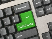 green keyboard key with the word solutions written on it