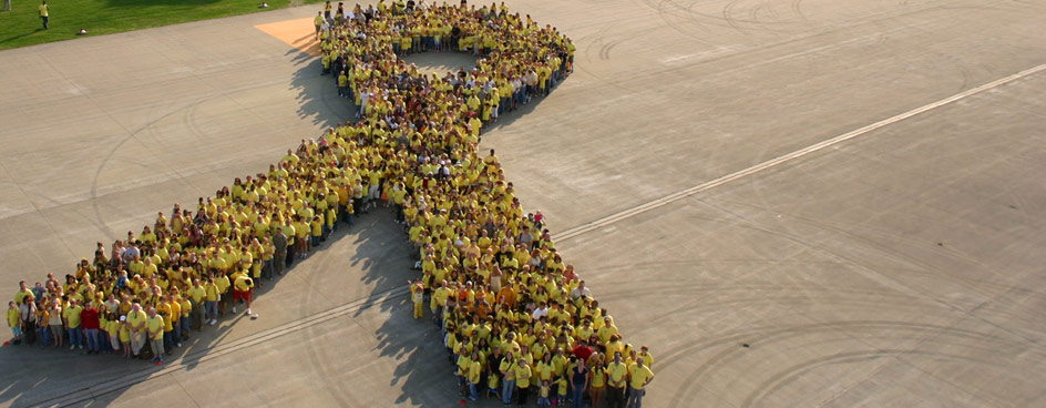 ANSBACH, Germany - On the evening of May 14, 1,385 Soldiers, family members, civilians and local nationals of the Ansbach military community came together at Storck barracks to set the unofficial armed forces record for the largest yellow ribbon formation.