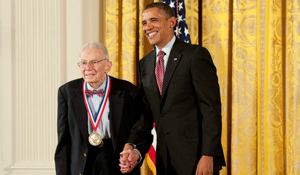 Art Rosenfeld, wearing medal, stands next to President Obama