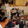 Secretary Salazar reading to children