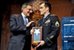 Defense Secretary Leon E. Panetta presents former Army Staff Sgt. Clinton L. Romesha with the Medal of Honor Flag at the Pentagon, Feb. 12, 2013. DOD photo by Glenn Fawcett