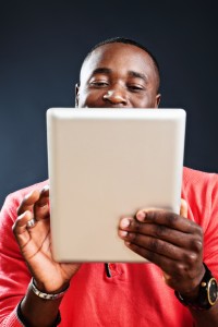Man holding a tablet device.