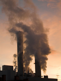 smoke billowing from the smoke stacks