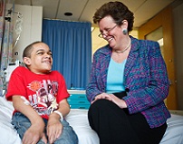 Lisa Guay-Woodford, M.D., with patient Michael Lewis