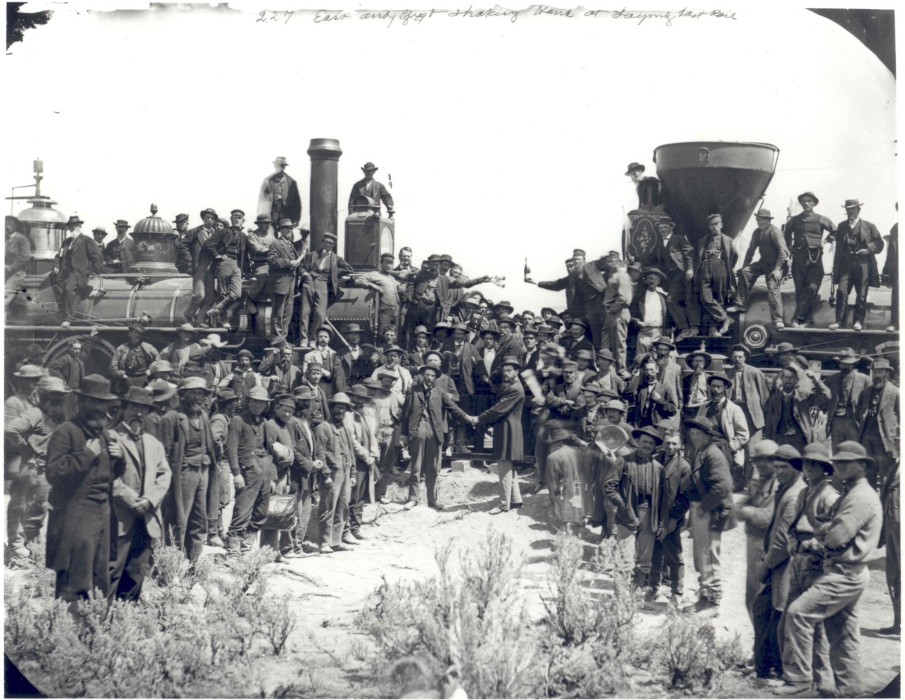Image description: This photo shows the joining of two railroads, marking the 143rd anniversary of the completion of the First Transcontinental Railroad across the United States. Completed on May 10, 1869, the railroad shortened the cross country trip from four months to just one week.
A ceremony was held in Promontory Summit, Utah, about 35 miles away from where the railroad was joined together by the “Golden Spike,” which finally connected the two sides of the railroad, marking its completion. The National Park Service now operates the Golden Spike Historical Site in Promontory Point, Utah.
Learn more about the First Transcontinental Railroad.
Photo by A.J. Russell and Charles Phelps Cushing, photographers documenting the event.