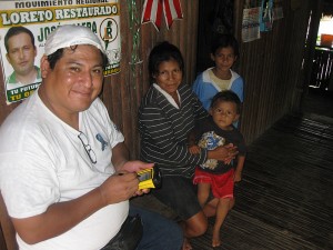 Dr. Jorge Gomez from the Peruvian Ministry of Health interviews residents of the Peruvian Amazon during a survey investigating populations at high risk of vampire bat exposures.