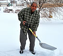 man shoveling snow