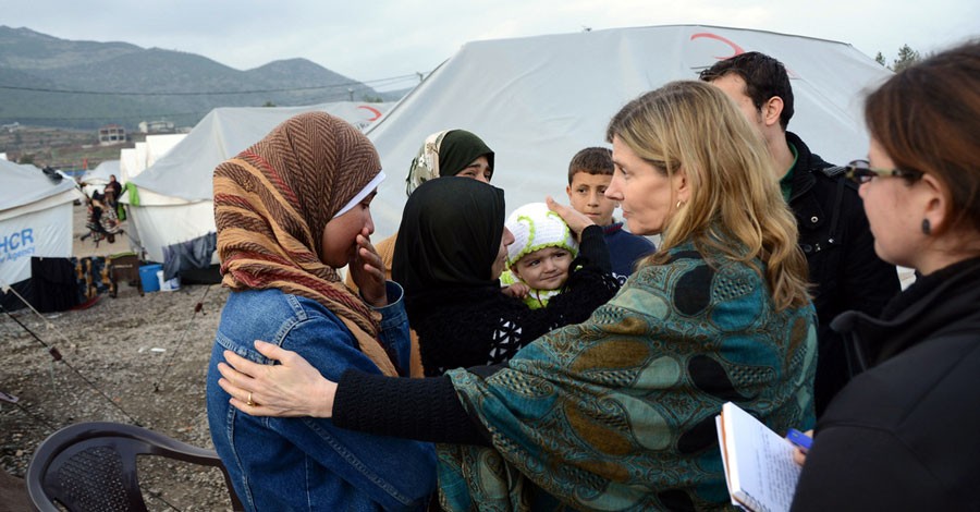 USAID Assistant Administrator for Democracy, Conflict, and Humanitarian Assistance Nancy Lindborg interacts with Syrian refugees at Islahiye Refugee Camp in Turkey on January 24, 2013. [State Department photo/ Public Domain]