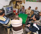 Iraqi men watch BBG's Alhurra TV