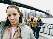 Girl aloof from the rest of her group.